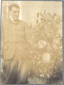 Arthur Bromley with a dog in his hand