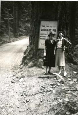 Muriel and woman viewing trees, maybe Cathedral Grove, VI