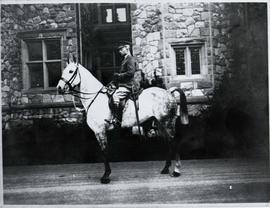 James Dunsmuir Jr on Kismet outside Hatley Castle. Kismet is standing still