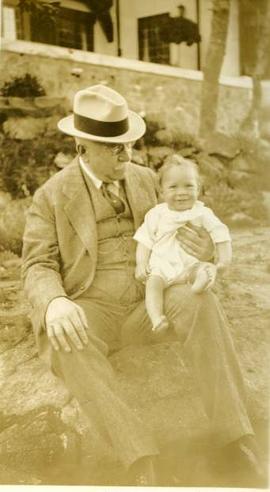 Baby on a man's knee, possibly Thomas Catterall