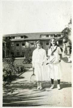 Two schoolgirls with tennis rackets at Miss Ransom and Miss Bridges’ School in Piedmont, California