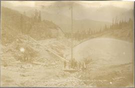 group at a mine shaft.