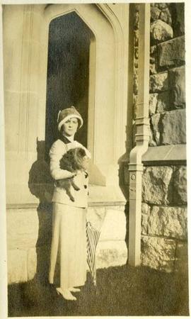 Marion Dunsmuir with a dog at Hatley Park