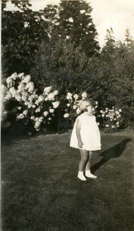 Joan Humphreys in a garden