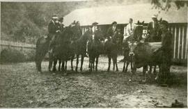 People on horseback with a cow and herdsman