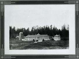 Newly completed dairy and barn building. Looking north. Silo and dairyman's cottage visible on the left