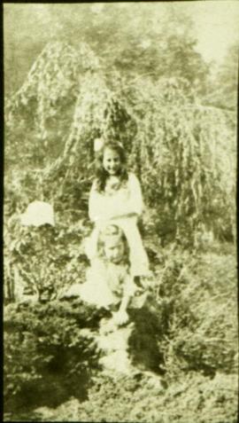 Ella and Frances Hayward in a garden, possibly the Japanese garden