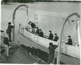 RCNC cadets lowering a boat 