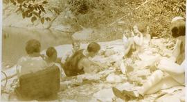 Large group on a riverbank