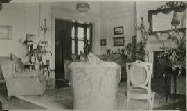 drawing room with chairs arranged at east fireplace.