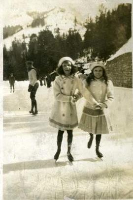 Dola (right) and a girl ice skating, Switzerland