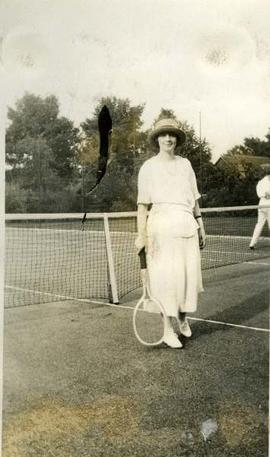 woman with tennis racket