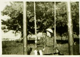 Ella and Frances Hayward on a swing