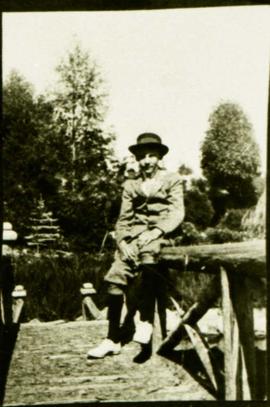 Harry Mann on the fishing bridge in Japanese garden