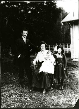 Phillip Francis Hayward and wife Minnie with daughters Ella and Frances outside at Hatley Park