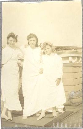 Girls in nightwear on Burleith roof