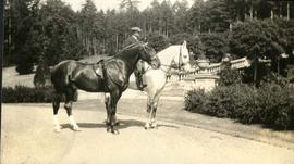 WEJ (Fred) Mann and two horses in front of Neptune Steps, Hatley Park