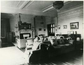 drawing room with sofas gathered in centre, from east