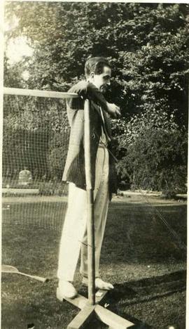 man at badminton net