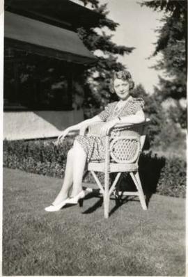 Muriel Dunsmuir sitting in wicker chair, Journey's End